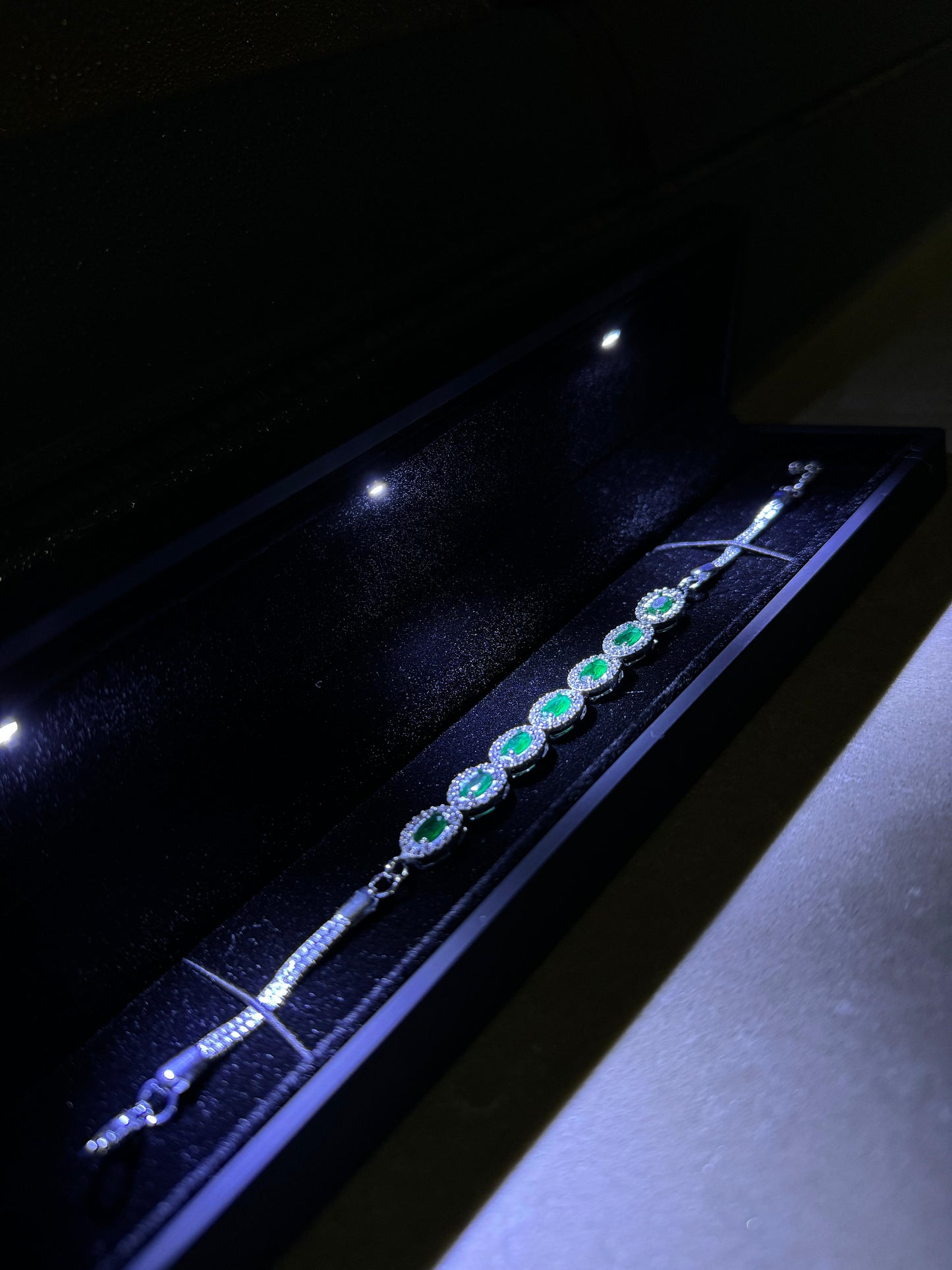 Women's Green Tennis Bracelet with Emerald Stones in Black Light-Up Box